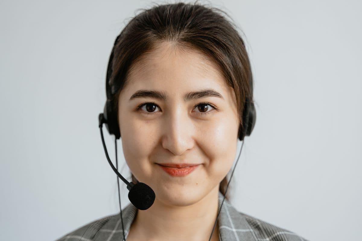 A support specialist talking a client through a claim.