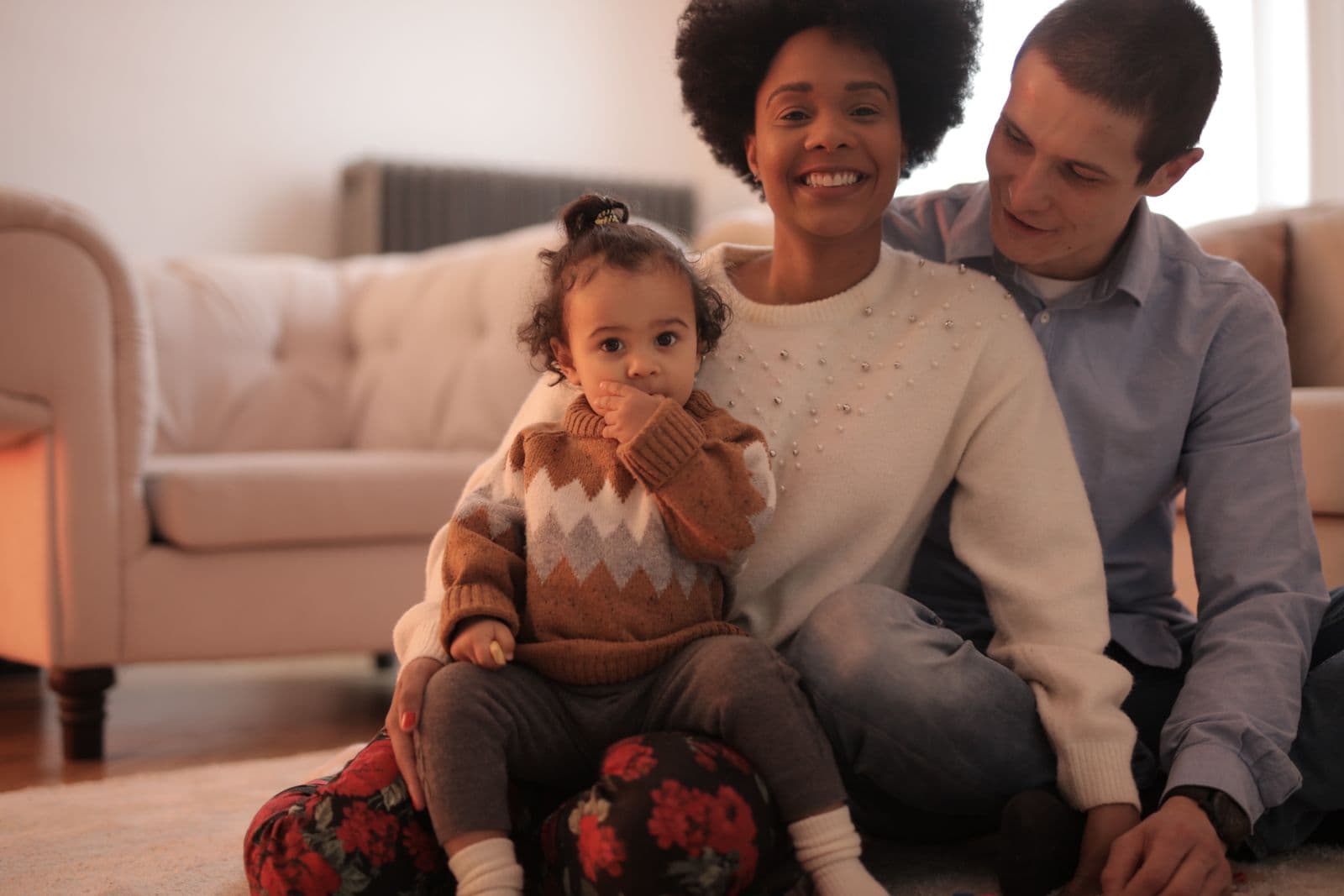 Parents and their children spending time together at home